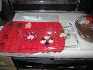 Candy molds with decorative color before the chocolate was poured on