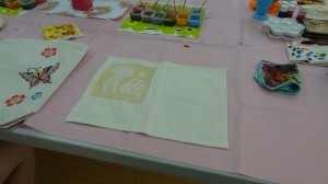 A cloth placemat with the rice-paste to allow for ease of painting.